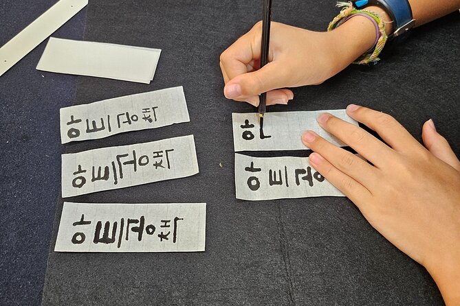 Create a Handmade Traditional Korean Notebook in Insadong - Writing your Korean name with a brush