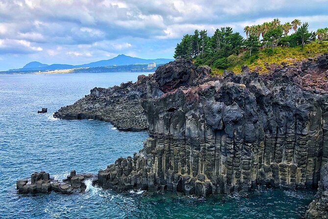 Discover Jeju in 3days: A Curated All-Inclusive Experience - Day 1: Stone Park, old trees, and Sunrise Peak
