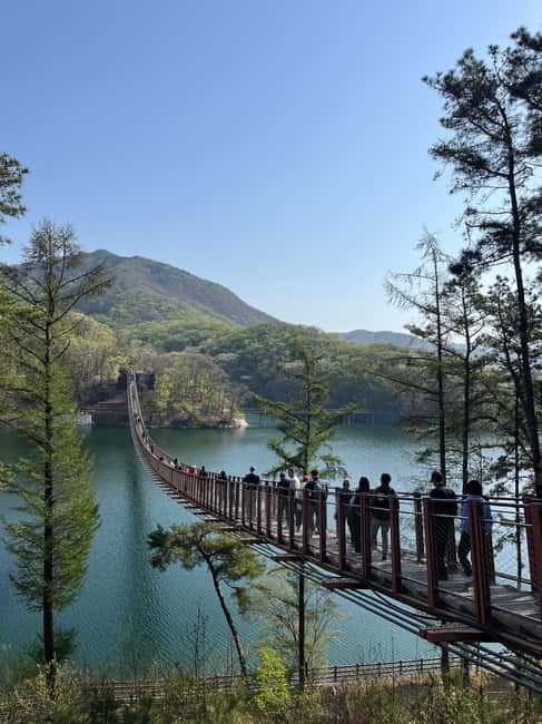 DMZ; NK Defector, 3rd Tunnel, Suspension Bridge,Hotel pickup - Passing Unification Village adds a quieter note