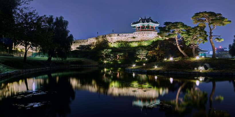 From Seoul: Suwon Hwaseong Fortress Night Tour - Walking the illuminated walls and towers