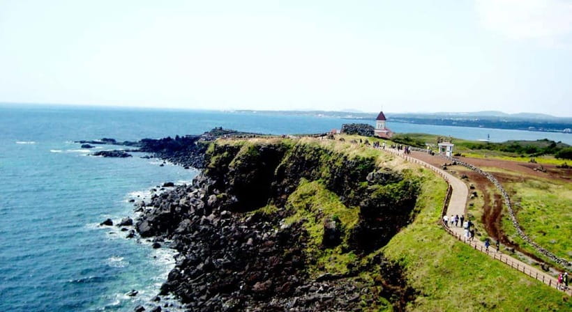 Jeju: Eastern UNESCO and Must-See Spots Tour - Seopjikoji: cliffs, open fields, and K-drama scenery