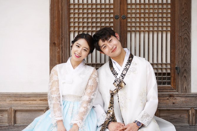Jeonju Hanok Village Hanbok Rental Experience Hanboknam - Choosing your outfit in a busy shop