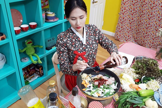 Local Home Korean Cooking Class & Market Adventure in Seoul - Cooking four Korean dishes at a local home