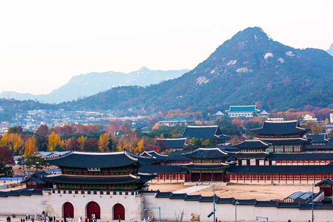 Private Seoul City Tour Palace, village, temple, market - Bukchon Hanok Village in traditional dress