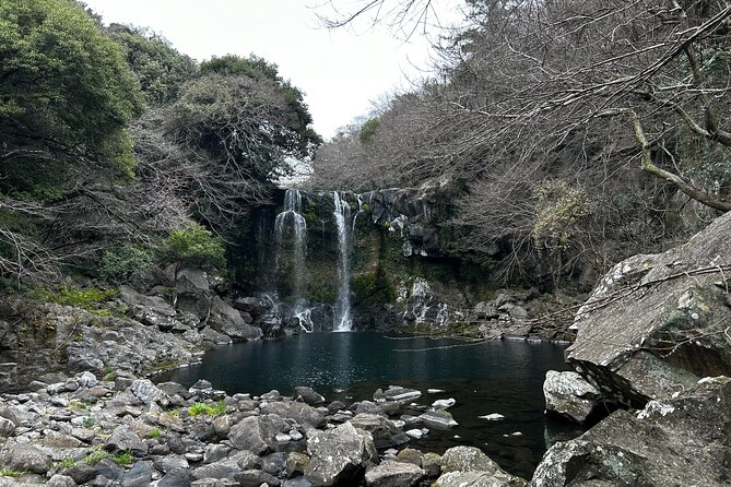 Seogwipo (The Southern City of Jeju) Jungmun Area Walking Tour - Cheonjeyeon Falls: the dramatic opening hour