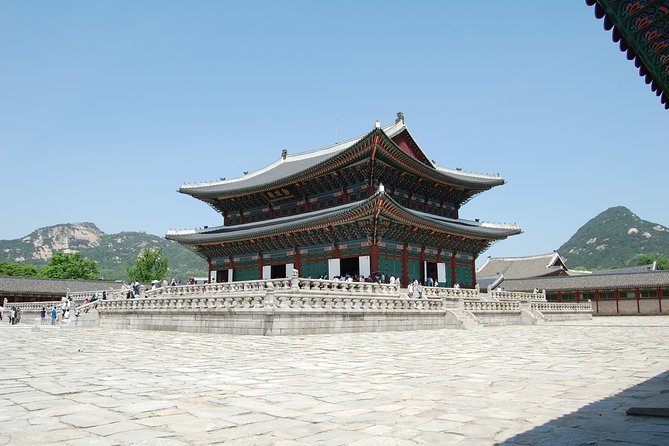 Seoul City Sightseeing Tour Including Gyeongbokgung Palace, N Seoul Tower, and Namsangol Hanok Village - Passing the Blue House and entering royal Seoul