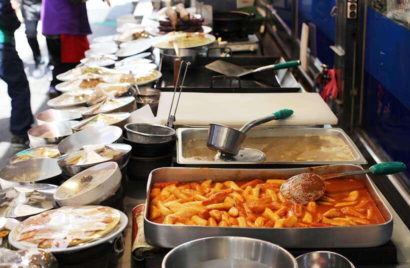 Seoul: Guided Street Food Tour at Namdaemun Market - What the guide adds at each food stop