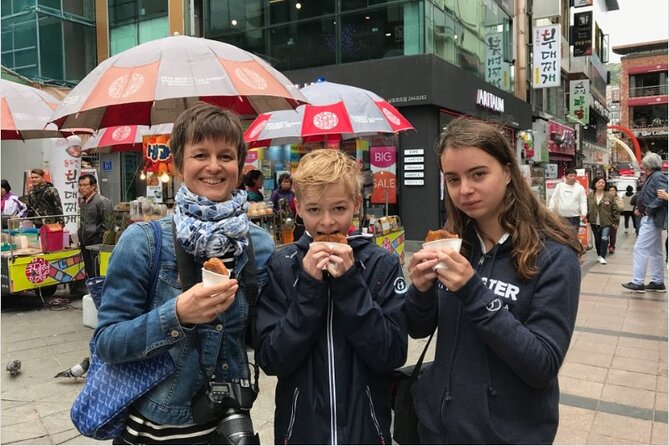 Seoul Private 4 Hour Tour with A Korean Buddy - Gwangjang Market: let the guide choose the bite