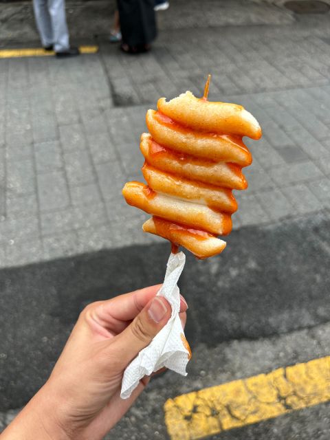 Taste hidden street food in Seoul with a 2.5h food tour - Moving between markets, neighborhoods, and restaurants