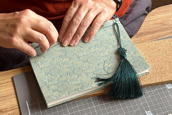 Traditional Korean Bookbinding Experience in Seoul, Hongdae - Choosing silk patterns and colorful threads